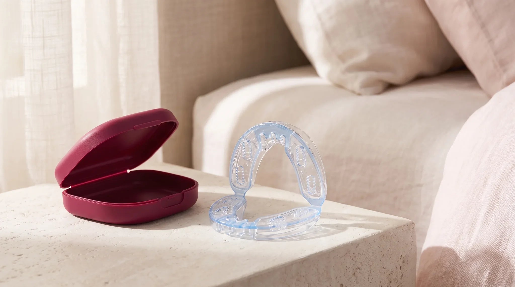 Orbique AirCurve travel case on a calm bedside table